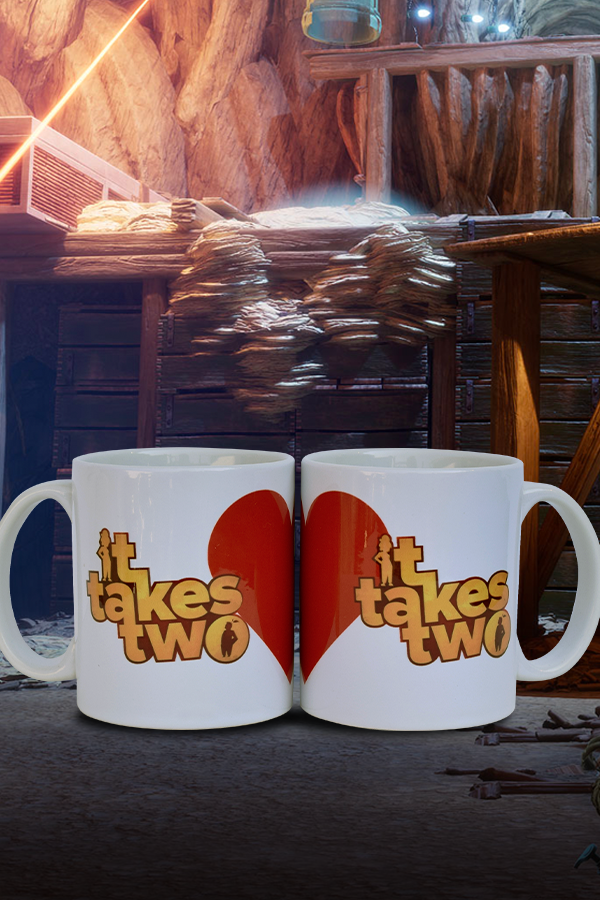 Image shows It Takes Two Mug Set with both mugs side by side facing front. Product is made with white high gloss ceramic with full-color sublimation. Product is sold as a set with one Cody and one May mug.