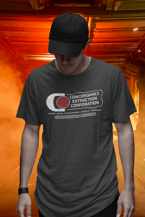 Image shows Dead Space Concordance Extraction Corporation Tee worn by male model looking down facing front. As the resource for maintaining and operating ship machinery, you need to ensure that you’re representing the corporation. This Tee lets your colleagues know that you’re one of them, giving you a free pass on Earth, Mars, Titan Station, Aegis VII, and Georgia IV.